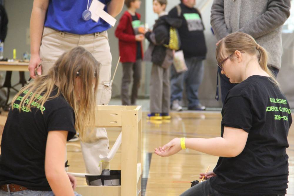 A duo of students working on a project